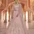 Engaging peach gota and thread embroidered organza semi stitched lehenga