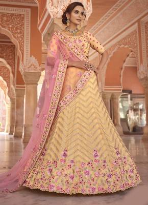Soothing yellow zari, zarkan, thread embroidered georgette Semi Stitched Lehenga 1