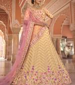 Soothing yellow zari, zarkan, thread embroidered georgette Semi Stitched Lehenga