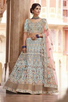 glamorous turquoise swarovski, sequins, dori embroidered crepe semi stitched lehenga