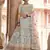 glamorous turquoise swarovski, sequins, dori embroidered crepe semi stitched lehenga