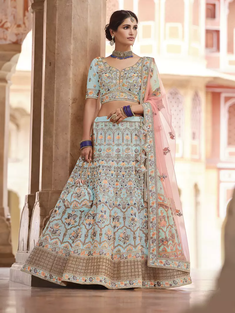 glamorous turquoise swarovski, sequins, dori embroidered crepe semi stitched lehenga