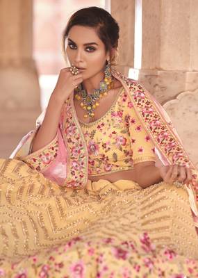 Soothing yellow zari, zarkan, thread embroidered georgette Semi Stitched Lehenga 3