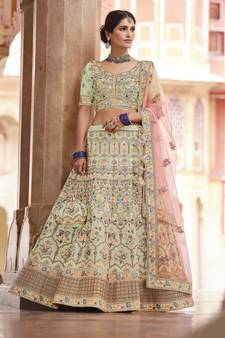 entrancing pista green swarovski, sequins, dori embroidered crepe semi stitched lehenga