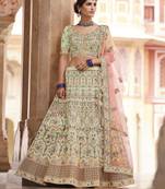 entrancing pista green swarovski, sequins, dori embroidered crepe Semi Stitched Lehenga