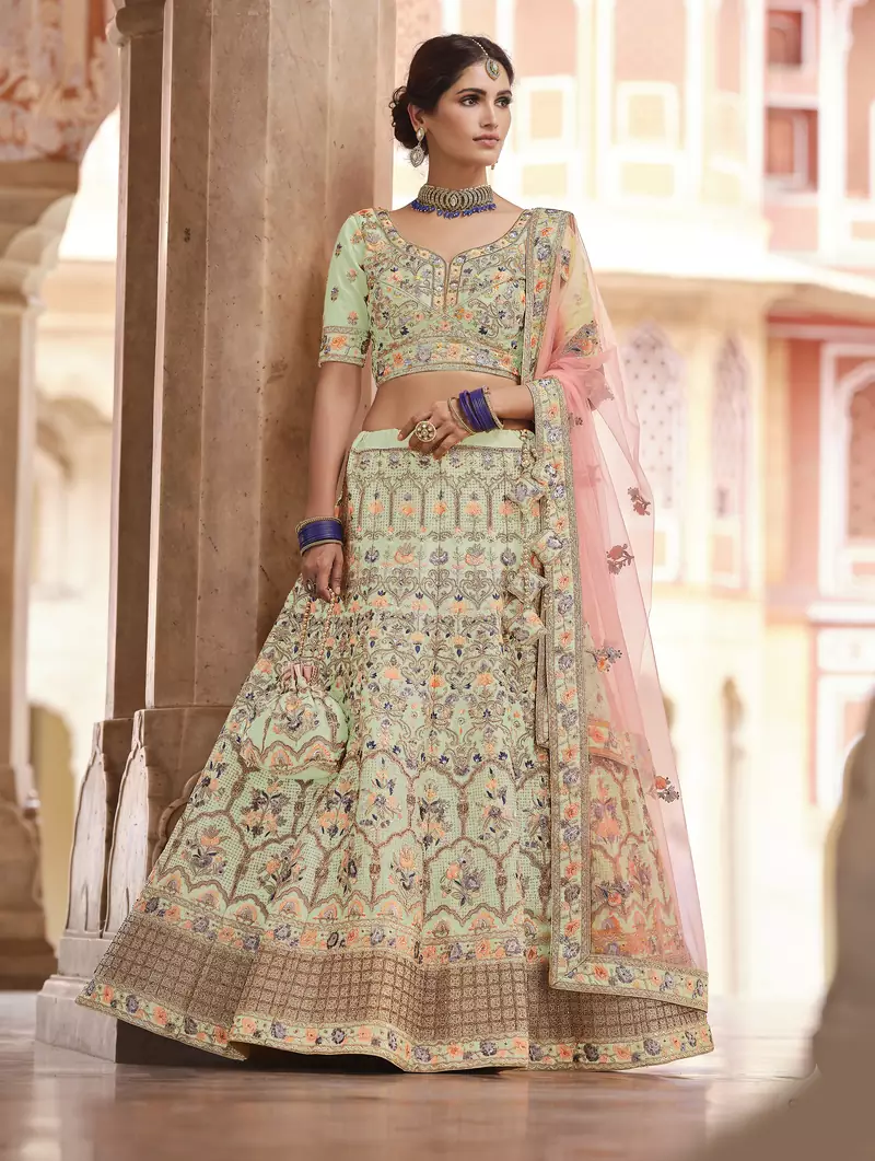 entrancing pista green swarovski, sequins, dori embroidered crepe semi stitched lehenga