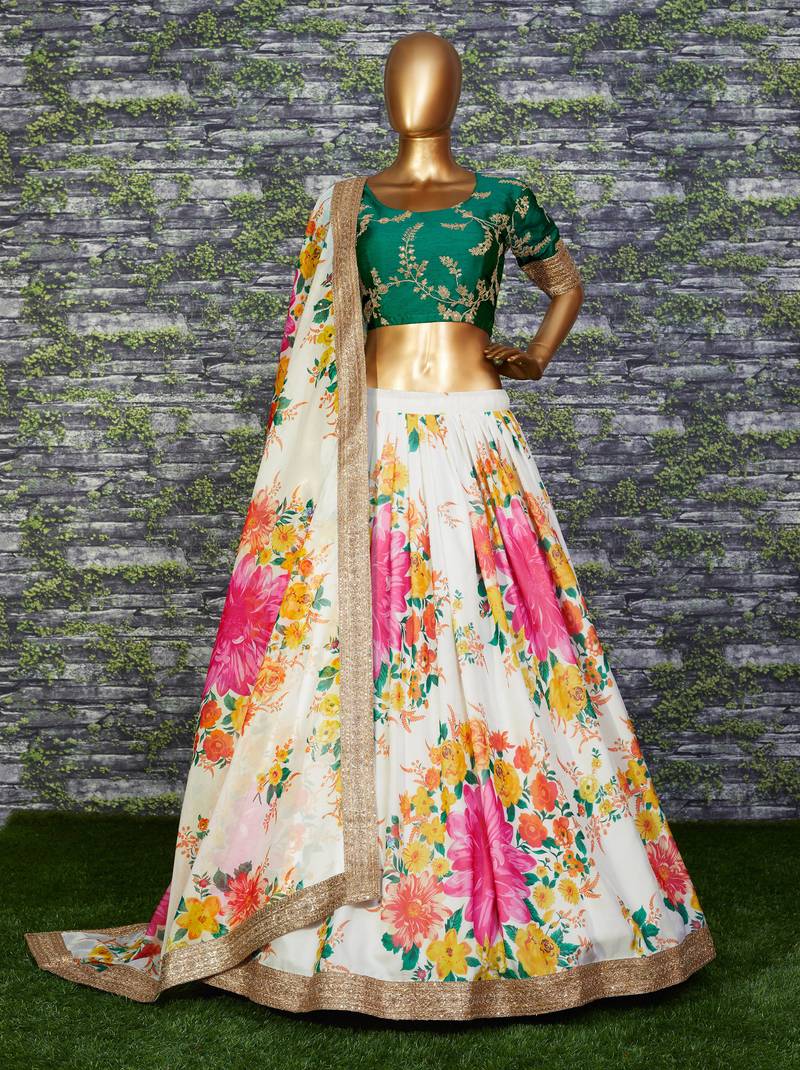 Engrossing Cream Floral Designer Lehenga with rich embroidered Green Blouse and Dupatta