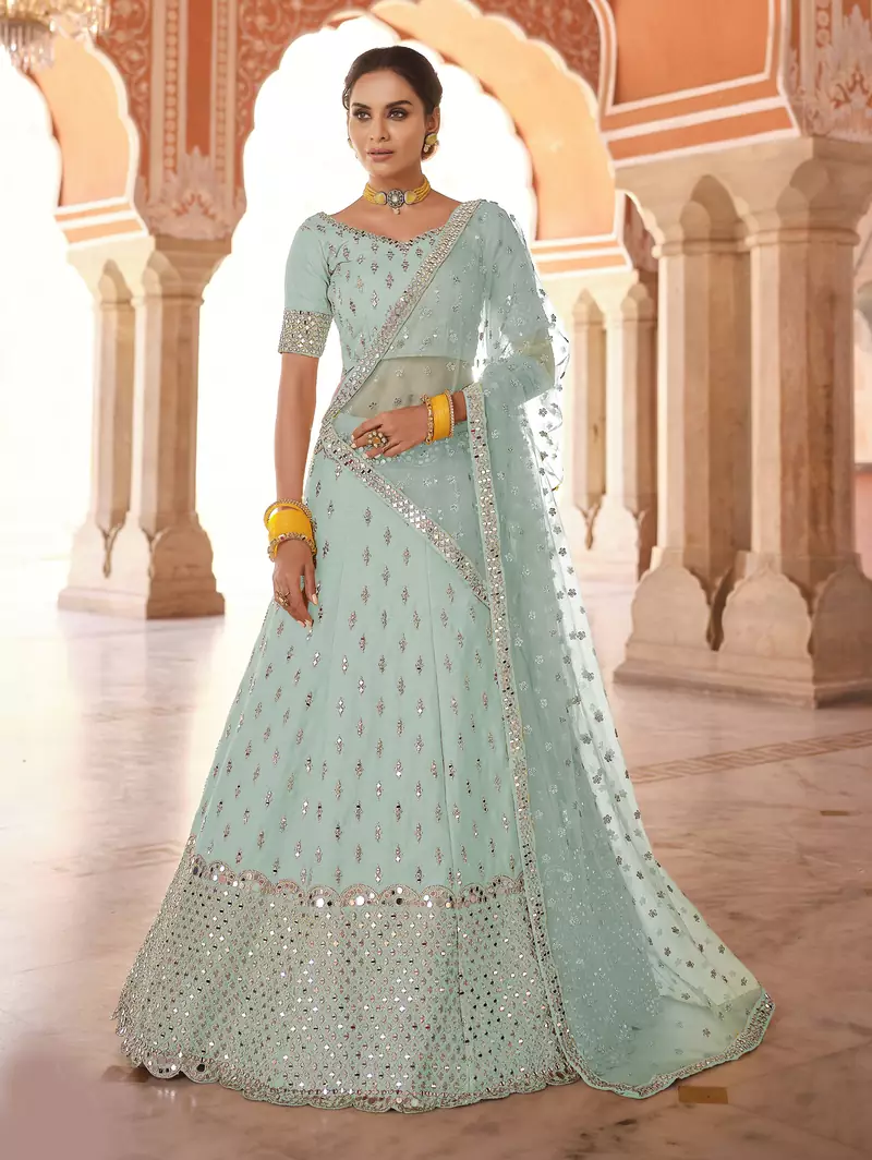 engaging turquoise real mirror, zari embroidered art silk semi stitched lehenga