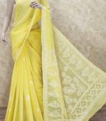 Yellow embroidered georgette saree with blouse