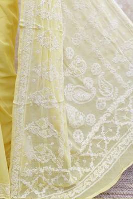 Yellow embroidered georgette saree with blouse 4