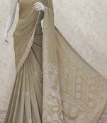 Green embroidered georgette saree with blouse