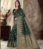 Dark green woven semi silk saree with blouse