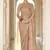 Brown thread, dori and sequins embroidered organza bridal saree with soft net blouse