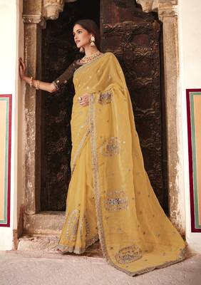 Mustard zari, mirror, and thread embroidered organza bollywood saree 1