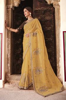 Mustard embroidered organza saree with blouse