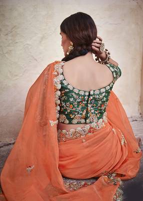 Orange embroidered organza saree with blouse 4
