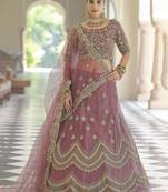 Mauve embroidered net semi stitched lehenga