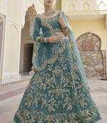 Green embroidered net semi stitched lehenga