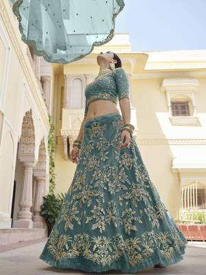 Green embroidered net semi stitched lehenga 2