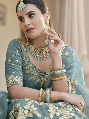 Green embroidered net semi stitched lehenga 3