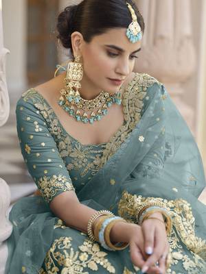 Green embroidered net semi stitched lehenga 4