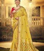 Yellow embroidered silk saree with blouse