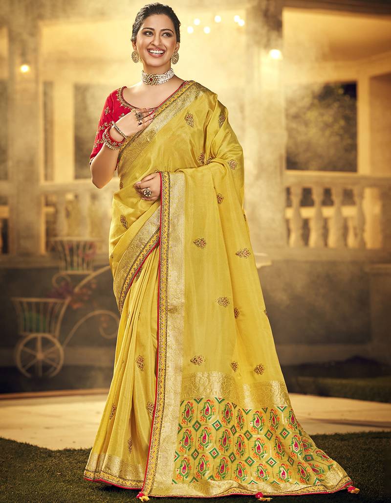 Yellow embroidered silk saree with blouse
