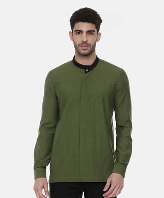 green malai cotton short kurta with contrast black collar. pair with denims or linen pants. 2