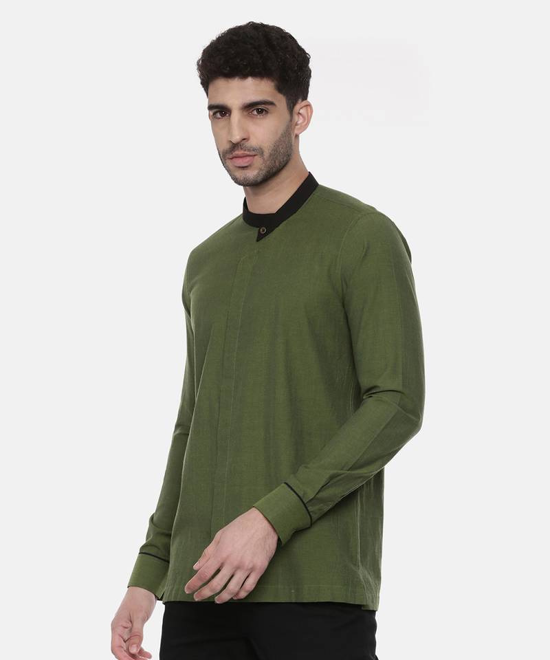 green malai cotton short kurta with contrast black collar. pair with denims or linen pants.