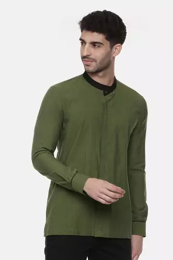 green malai cotton short kurta with contrast black collar. pair with denims or linen pants.