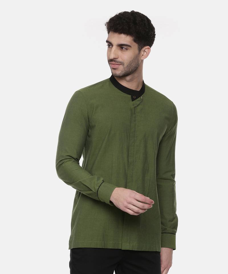 green malai cotton short kurta with contrast black collar. pair with denims or linen pants.