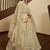 Beige thread with sequins embroidered art silk semi stitched wedding lehenga for bridal