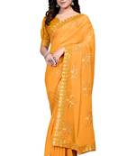 Yellow embroidered georgette saree with blouse