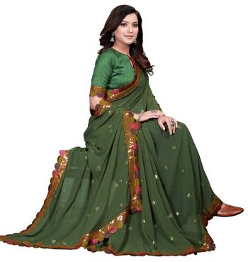Dark green embroidered georgette saree with blouse 4