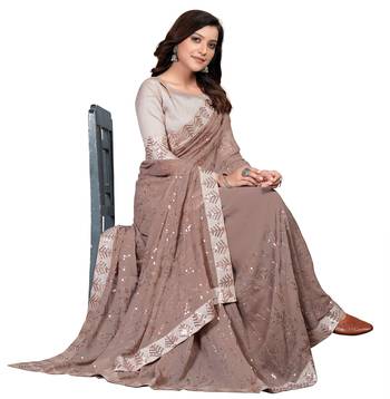 Brown embroidered georgette saree with blouse 4