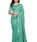 Teal embroidered georgette saree with blouse
