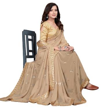Beige embroidered georgette saree with blouse 4