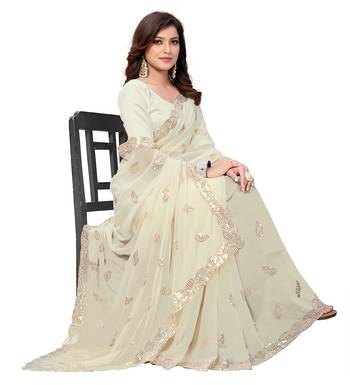 Cream embroidered georgette saree with blouse 4