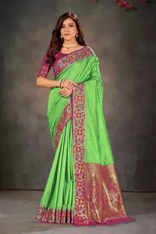 Light green woven banarasi silk saree with blouse