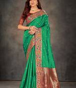 Green woven banarasi silk saree with blouse