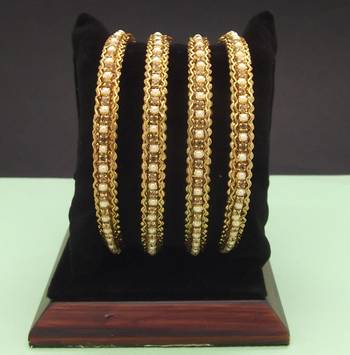 Gold bangles-and-bracelets 1