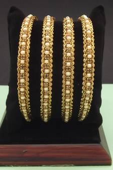 Gold bangles-and-bracelets