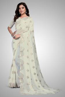 Cream embroidered georgette saree with blouse