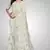 Cream embroidered georgette saree with blouse