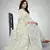Cream embroidered georgette saree with blouse