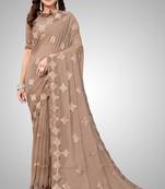 Beige embroidered georgette saree with blouse