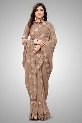 Beige embroidered georgette saree with blouse 2