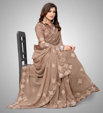 Beige embroidered georgette saree with blouse 4