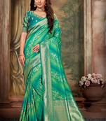 Green woven banarasi saree with blouse