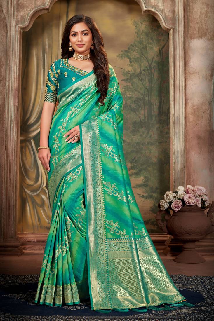 Green woven banarasi saree with blouse